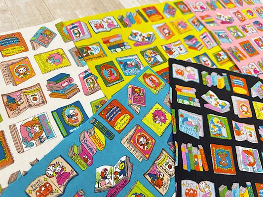 シーチングプリント夢見るにゃんこ物語「本の世界へ」