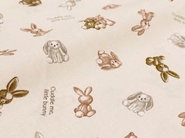 くすみカラーシーチングプリント「テディラビット」アイボリー