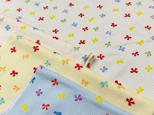 カラフルなリボンのクールクロスニット