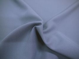 お洋服づくりのためのトロピカルストレッチ無地ブルーグレー