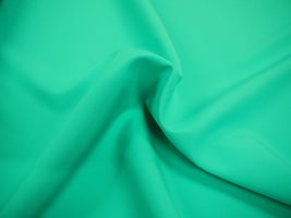 お洋服づくりのためのトロピカルストレッチ無地エメラルド