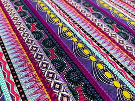 アフリカン調シーチングプリント「ストライプ」紫系×黄玉