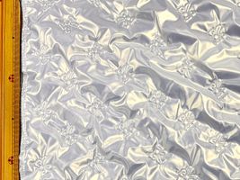 リボンモチーフの高周波熱圧着キルティングパールホワイト