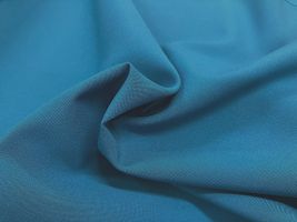 お洋服づくりのためのトロピカルストレッチ無地ビタミンブルー