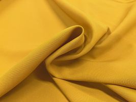 お洋服づくりのためのトロピカルストレッチ無地マスタード