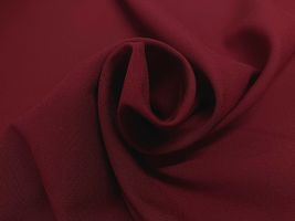 お洋服づくりのためのトロピカルストレッチ無地エンジ