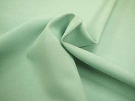 お洋服づくりのためのトロピカルストレッチ無地ペールグリーン