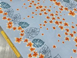 「プルメリア」の綿ポリハワイアンプリントライトブルー系