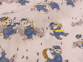 【現品限り特価】シーチングプリント「ニャンコ楽団のマーチ」ベビーピンク