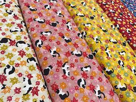 シーチングプリント「ハチワレネコともみじ」_拡大イメージ