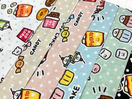 シーチングプリント FOOD YURU「ワイワイおかし柄」_拡大イメージ