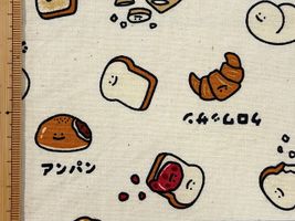シーチングプリント FOOD YURU「ほっこりパン柄」生成(綿かす残し)