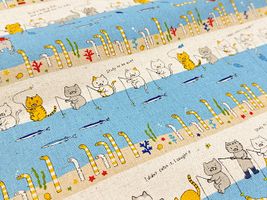 コットンこばやし綿麻キャンバスプリント「釣り猫 feat.チンアナゴ」水色