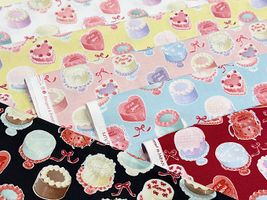 シーチングプリント un/no「センイルケーキ」_拡大イメージ