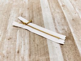 ■お取り寄せ商品■12cm玉付きゴールドファスナーオフホワイト