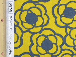 コットンこばやし くるくるフラワーの綿麻キャンバスカラシ地