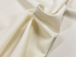 お洋服づくりのためのトロピカルストレッチ無地アイボリー